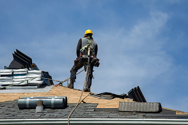 Professional Gutter Installation technician working in Monticello, IA